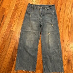 Women's Distressed Blue Jeans